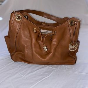 Michael Kors brown leather hobo bag.
